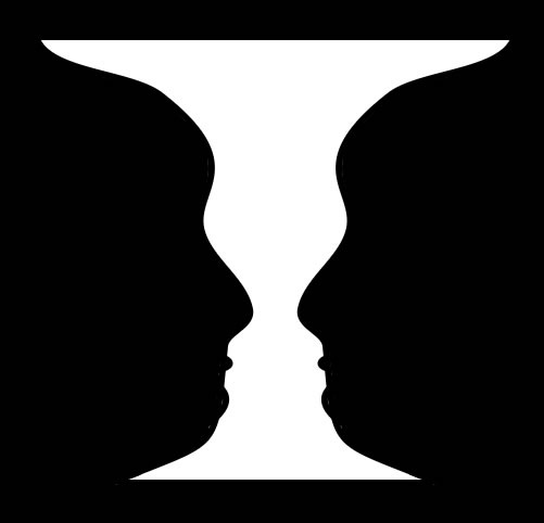 This face and vase picture is a very common optical illusion. Do you a white vase or two identical black faces looking at each other?
