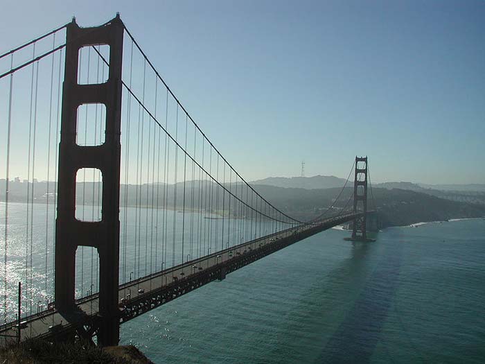 The Golden Gate Bridge is a famous suspension bridge that reaches over the San Francisco Bay. Completed in 1937, the Golden Gate Bridge is a well known landmark that attracts a large number of tourists and photographers.