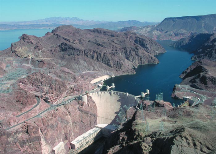 This excellent photo helps capture the incredible size of the Hoover Dam. Completed in 1936, the Hoover Dam is located in the Black Canyon of the Colorado River on the border of Arizona and Nevada in the USA.
