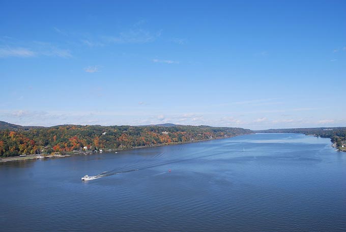 This image shows the Hudson River which runs through eastern New York. The photo was taken from a footbridge that crosses the river.