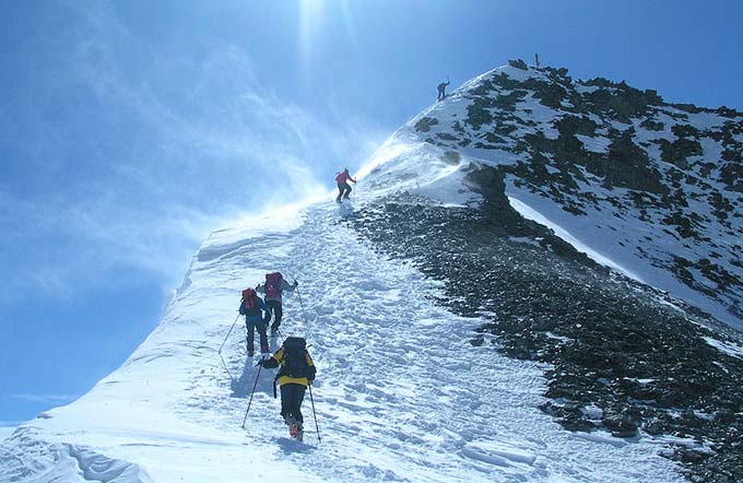 Five climbers can be seen in this photo as they make their way up K2, the second tallest mountain in the world and one the most difficult to climb. The peak of K2 is 8611 metres (28251 feet) above sea level.