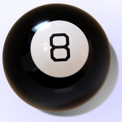 A close up photo of an 8 ball used for playing pool.