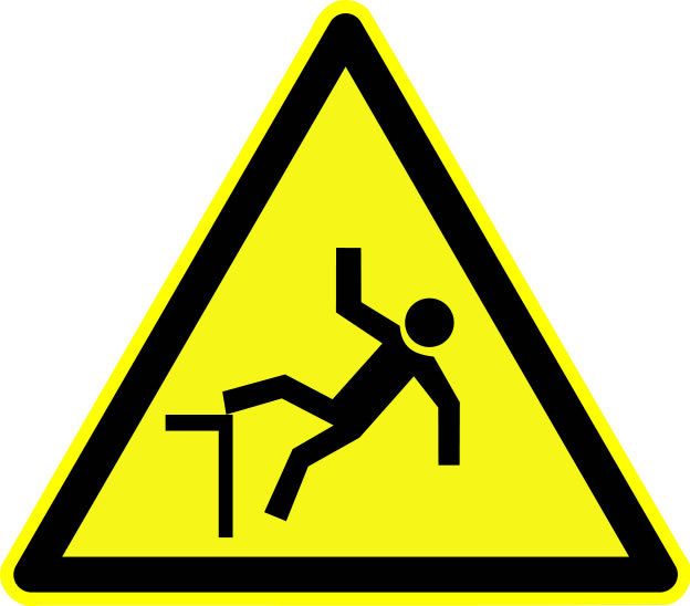 A black and yellow warning sign showing a person falling backwards over an edge.