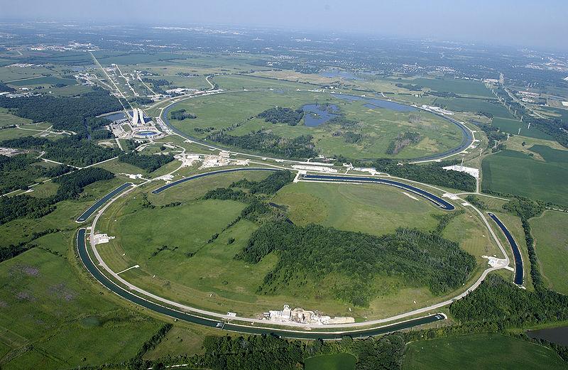 This photo shows the Fermi National Accelerator Laboratory. The Main Ring and Main Injector can easily be seen from the air, as well as the circular ponds that dissipate waste heat from the various equipment.