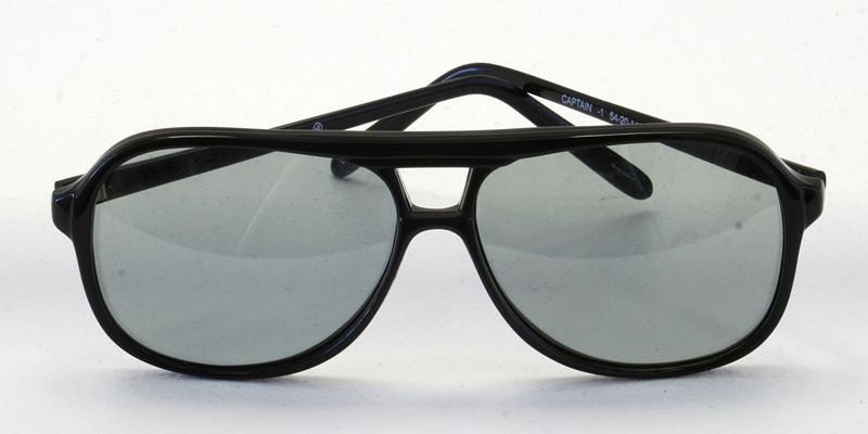 These polarized glasses offer high protection from UV rays produced by the sun. The sunglasses sit facing forward on a white table.
