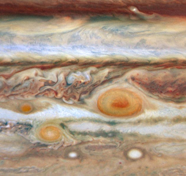 A close up photo of Jupiter's great red spot as seen by the Hubble Space Telescope.