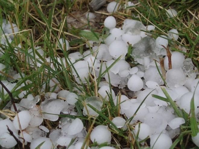 This photo shows a large bunch of hail stones not long after a particularly heavy hail shower. The hail stones are very big, capable of causing damage to property and even unlucky people caught outside during the storm.